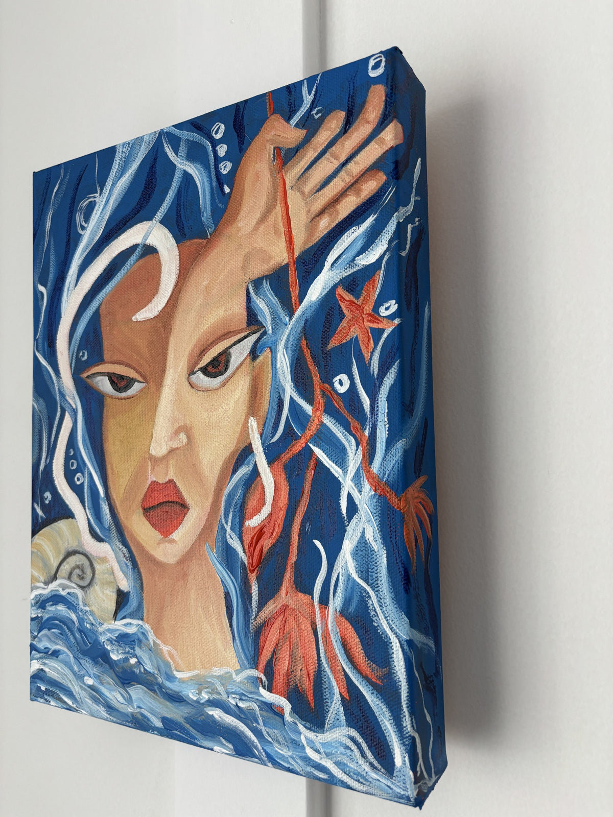 Side view of Bloom Beneath the Tide showing the painted canvas edge